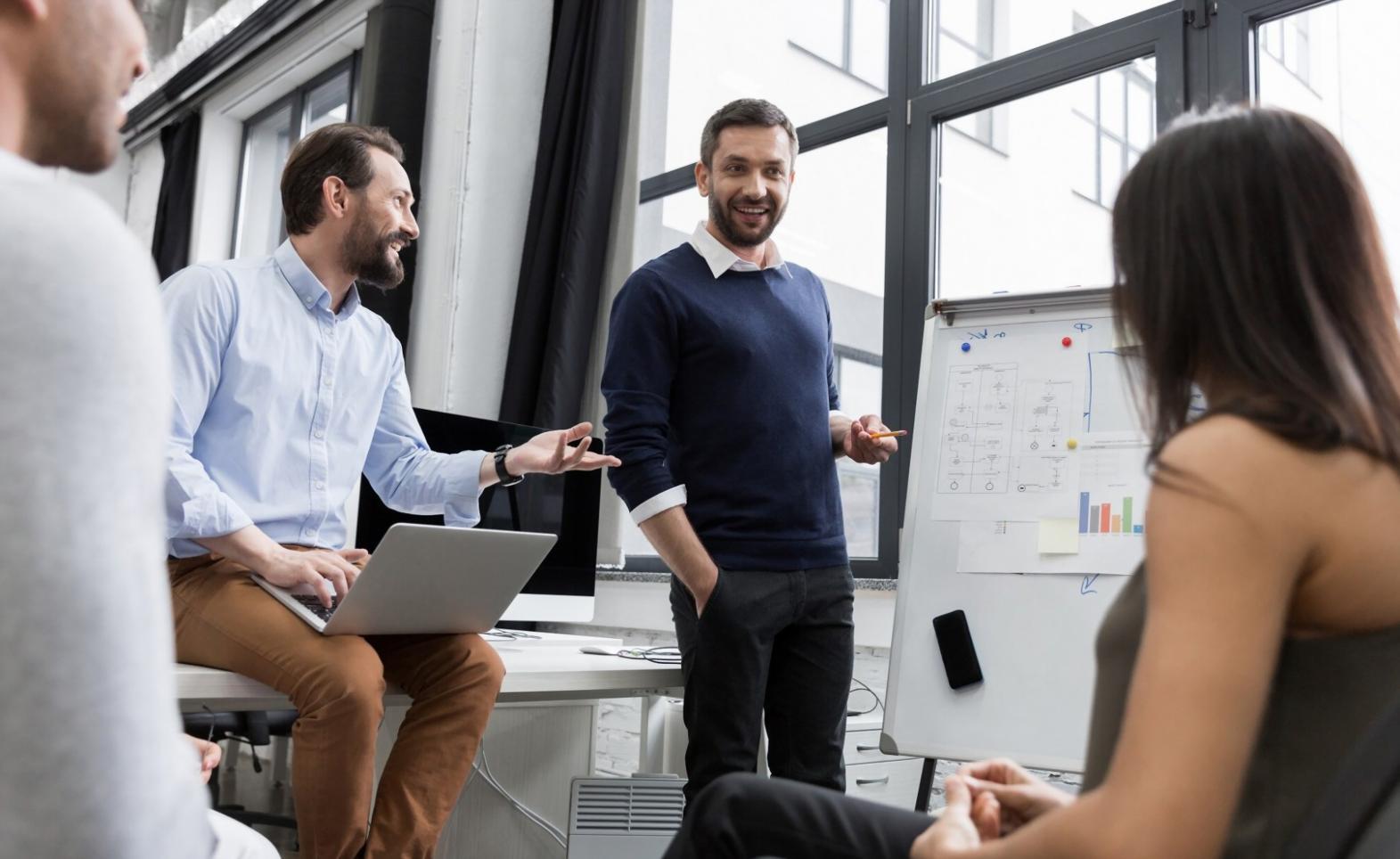 Business planning session with financial charts and documents